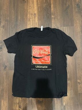 Coca Cola Black Tee with Red Logo and Gold Accents